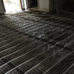 Fitting Under floor heating limecrete flooring in St Buryan Cornwall
