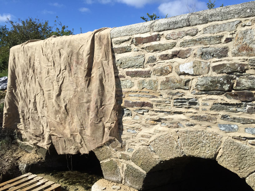 Traditional Bridge Lime Pointing being Covered with Hessian